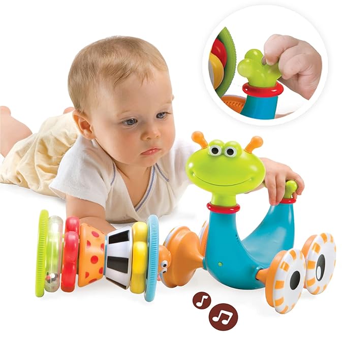Yookidoo Musical Crawl 'N' Go Snail Toy with Stacker - Promotes Baby's Crawling and Walking. Rolls and Spins Its Shell As It Moves.