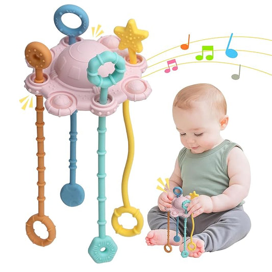 Montesorri-Toys - Pull String Toys for Baby - Made of 100% Food Grade Silicone with Built-in Rattle Function and Easy to Clean Design (Pink)