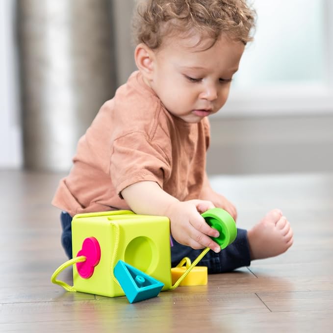 Fat Brain Toys OombeeCube, Toddler and Baby Toys 10 Months and Up, Travel-Friendly Shape Sorter with Tethered Shapes for Early Learning